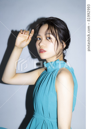 Female in green dress 81992993