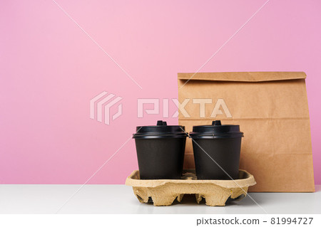 Paper bags with take away food and coffee cups containers 81994727