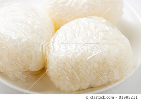 Rice balls grasped using lap due to sanitary considerations. Rice balls grasped using lap due to sanitary considerations. 81995211