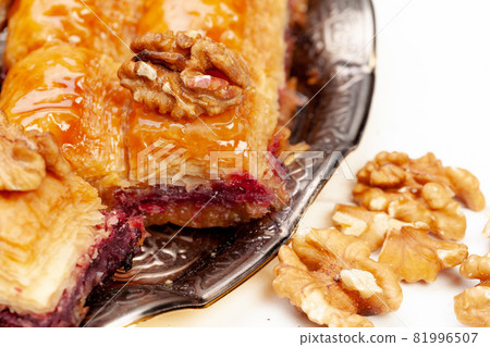 Stacked turkish baklava dessert in a plate close up 81996507