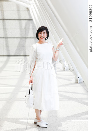 Middle female middle senior enjoying white Middle female middle senior enjoying white 81996862