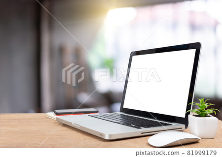 Desk Laptop with blank screen on table blur background with bokeh Desk Laptop with blank screen on table blur background with bokeh 81999179