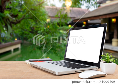 Desk Laptop with blank screen on table  blur background with bokeh 81999196