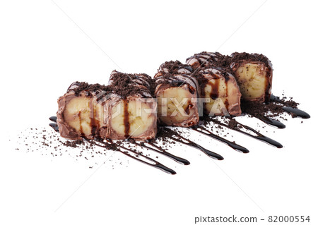 Fruit sushi rolls with chocolate cream and banana isolated on white 82000554