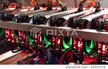 Bitcoin mining farm. Rig for cryptocurrency miner Bitcoin mining farm. Rig for cryptocurrency miner 82001418
