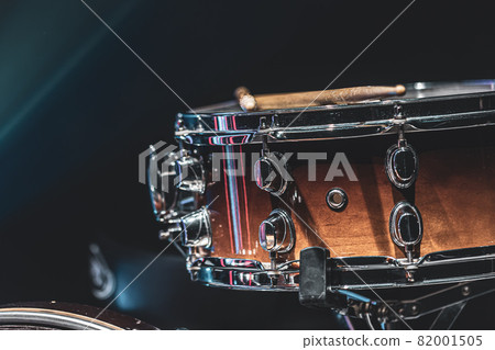 Snare on a black background, musical instrument, musical concept. Snare on a black background, musical instrument, musical concept. 82001505