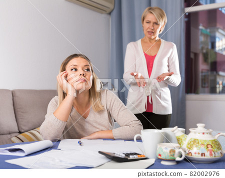 Mother scolds her adult daughter Mother scolds her adult daughter 82002976