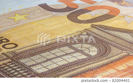Macro close up on the design surface of 50 euro notes. Banknotes of the European Union. Wallpaper background of money. Detailed currency closeup. Euros isolated flat capture, New Fifty Euro Note 82004401