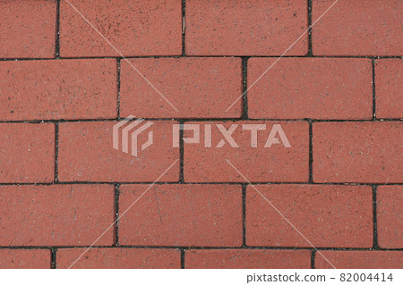 Red brick wall. Wall texture, background. Stock photo for wallpaper or texture 82004414