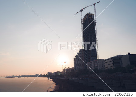 Beach in Limassol with high-rise building construction site Beach in Limassol with high-rise building construction site 82007130