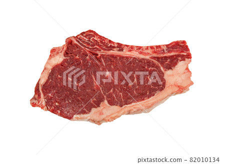 Close up raw beef ribeye steak isolated on white Close up raw beef ribeye steak isolated on white 82010134