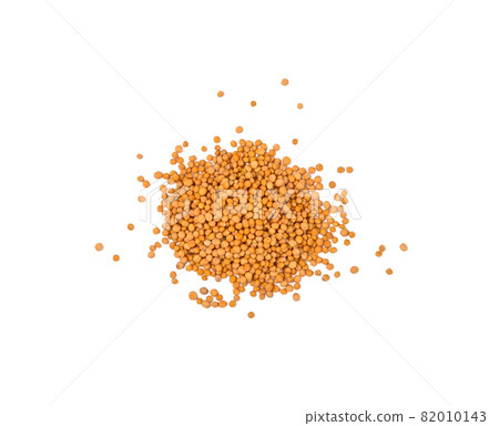 Heap of yellow mustard seeds isolated Heap of yellow mustard seeds isolated 82010143