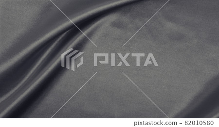 Smooth elegant brown silk or satin luxury cloth texture as abstract background. Luxurious background design wallpaper. In Sepia toned. Retro style 82010580