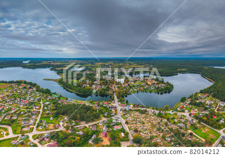 Small city of Veisiejai in Lithuania, aerial photo with city with lakes from above Small city of Veisiejai in Lithuania, aerial photo with city with lakes from above 82014212