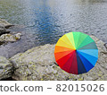colorful ambarella against a lake of water room for text 82015026