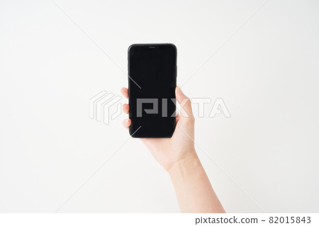 Hand with a smartphone Hand with a smartphone 82015843