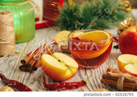 Beautiful composition with glint wine cup and ingridients on wooden table 82016705