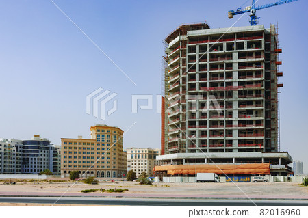 Building construction site in a street in Dubai 82016960