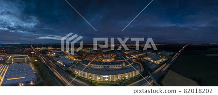 Drone panorama over industrial area of German municipality Weiterstadt in Hesse after sunset Drone panorama over industrial area of German municipality Weiterstadt in Hesse after sunset 82018202