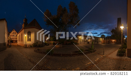 View of the historic protestant church of Walldorf in hesse during sunset 82018211
