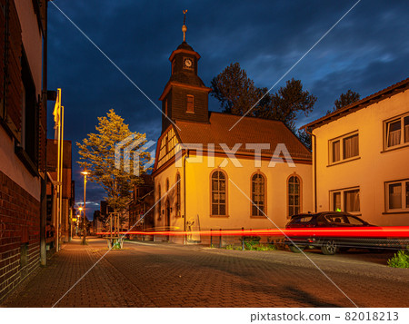 View of the historic protestant church of Walldorf in hesse during sunset View of the historic protestant church of Walldorf in hesse during sunset 82018213