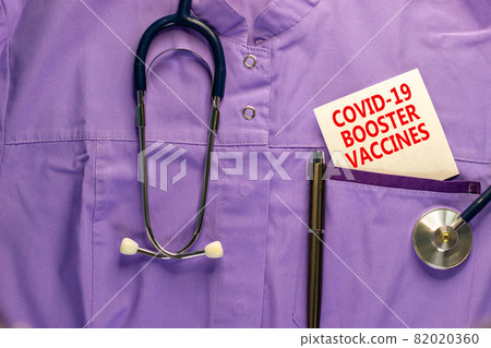 Covid-19 booster shots vaccines symbol. Medical uniform, white card with words Covid-19 booster vaccines, metalic pen and stethoscope. Covid-19 booster shots vaccines concept. Covid-19 booster shots vaccines symbol. Medical uniform, white card with words Covid-19 booster vaccines, metalic pen and stethoscope. Covid-19 booster shots vaccines concept. 82020360