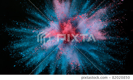 Freeze motion shot of color powder explosion isolated on black background. 82020850