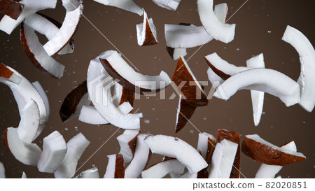 Freeze motion of flying coconuts pieces 82020851