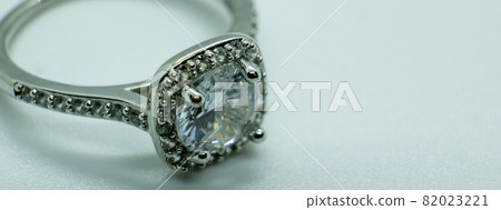 macro close-up photo silver diamond ring on white background macro close-up photo silver diamond ring on white background 82023221