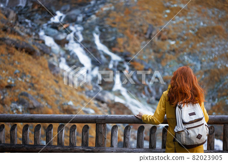 girl on the background of a waterfall girl on the background of a waterfall 82023905