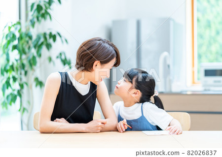 Parents and children studying in the living room. Parents and children studying in the living room. 82026837