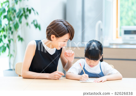 Parents and children studying in the living room. Parents and children studying in the living room. 82026838