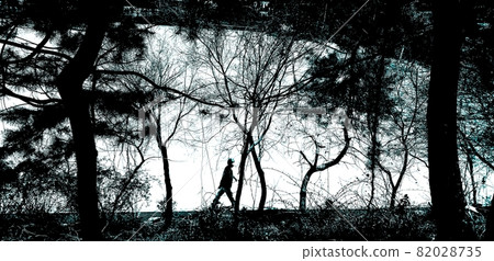 Man jogging on local playground Man jogging on local playground 82028735