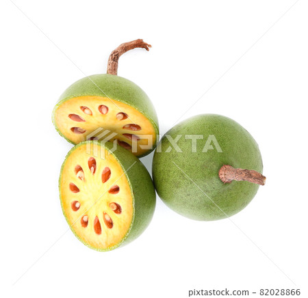Medicinal Bael fruits on white background Medicinal Bael fruits on white background 82028866