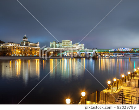 Pushkinskiy bridge, Moscow, Russia. Pedestrian bridge with night illumination. Bridge to Gorky Park. Embankment of the Moscow River 82029799