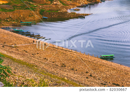 A resoervoir with the mountain background at Dam Khun Dan Pra Kan Cho, Nakhonnayok, Thailand A resoervoir with the mountain background at Dam Khun Dan Pra Kan Cho, Nakhonnayok, Thailand 82030667