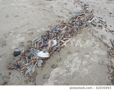 fishing net full of plastic waste. Symbol fo ocean pollution 82030893