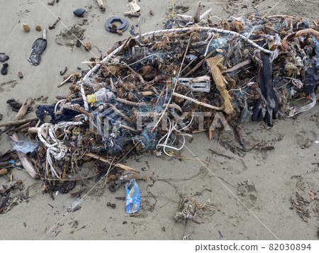 fishing net full of plastic waste. Symbol fo ocean pollution 82030894