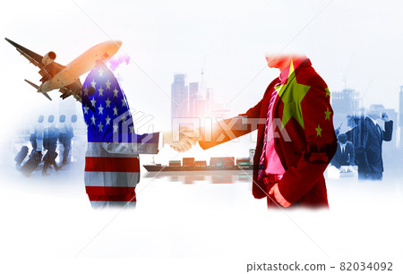 two businessman shake hands, china-usa trade war , The world logistics , logistic network distribution on background Industrial Container Cargo freight ship for fast instant shipping two businessman shake hands, china-usa trade war , The world logistics , logistic network distribution on background Industrial Container Cargo freight ship for fast instant shipping 82034092