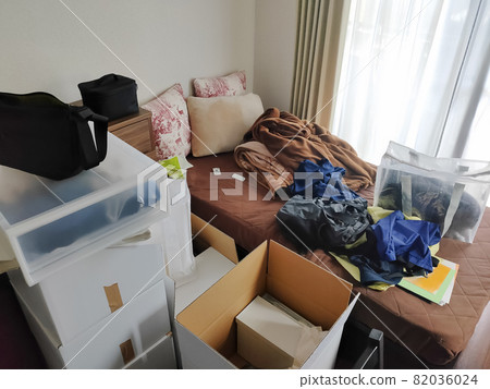 Room cluttered with moving packing Room cluttered with moving packing 82036024