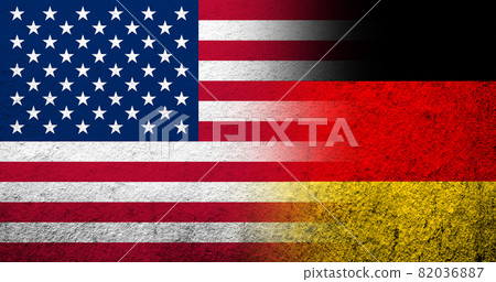 United States of America (USA) national flag with national flag of Germany . Grunge background 82036887