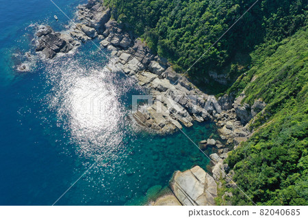 Aerial view of the coastline of the rock wall under Mihonoseki Lighthouse 82040685
