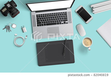 Minimal work space : Laptop, camera, coffee, camera, pen, pencil, notebook, smartphone, stationery on blue background for copy space. Minimal work space : Laptop, camera, coffee, camera, pen, pencil, notebook, smartphone, stationery on blue background for copy space. 82040819