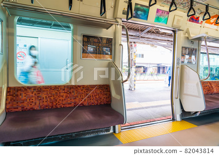 Inside the train from Takao on the Chuo Line to Tokyo Inside the train from Takao on the Chuo Line to Tokyo 82043814