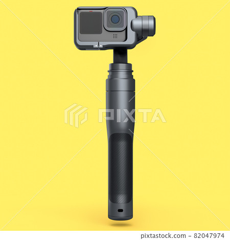 Photo and video lightweight black action camera with steadicam on yellow Photo and video lightweight black action camera with steadicam on yellow 82047974