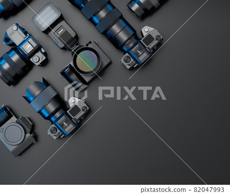 Top view of designer workspace and photography gear on black table background 82047993