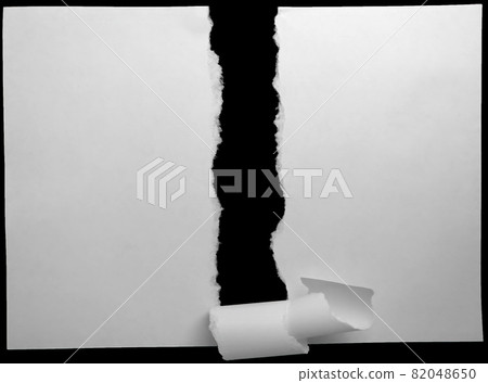 A narrow strip of white paper torn out by hands - for your creative designs 82048650