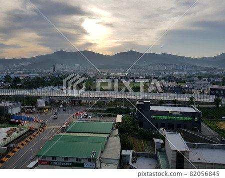 Construction. Development site. City. Building. Morning. Mountain. 82056845