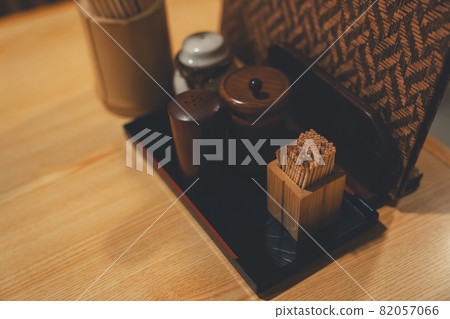 Seasoning storage on the table of the restaurant 82057066