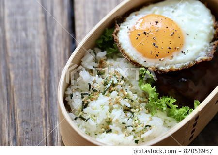 Hamburger steak bento in a bento box 82058937